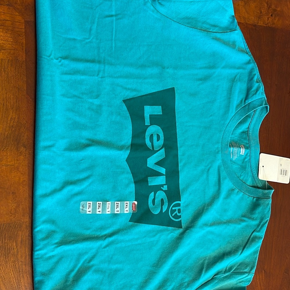 Brand new never worn men’s Levi shirt.